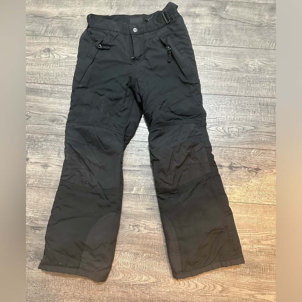 Black snow pants. Zipper and snap, adjustable stable Velcro sides